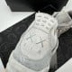 KAWS x Air Jordan 4 Retro 'Cool Grey' KAWS x Air Jordan 4 Retro 'Cool Grey'